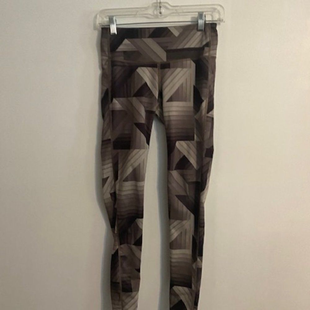 Athleta Brown/Tan Geometric pattern leggings, size XS